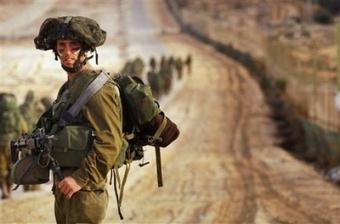 In&nbsp;this&nbsp;photo&nbsp;released&nbsp;by&nbsp;the&nbsp;Israeli&nbsp;army,&nbsp;Israeli&nbsp;soldiers&nbsp;walk&nbsp;towards&nbsp;the&nbsp;northern&nbsp;Gaza&nbsp;Strip&nbsp;as&nbsp;seen&nbsp;from&nbsp;the&nbsp;Israeli&nbsp;border&nbsp;with&nbsp;Gaza,&nbsp;Monday,&nbsp;Jan.&nbsp;12,&nbsp;2009.&nbsp;Israeli&nbsp;ground&nbsp;troops&nbsp;battled&nbsp;Palestinian&nbsp;militants&nbsp;in&nbsp;the&nbsp;streets&nbsp;of&nbsp;a&nbsp;densely&nbsp;populated&nbsp;Gaza&nbsp;City&nbsp;neighborhood&nbsp;early&nbsp;Tuesday,&nbsp;destroying&nbsp;dozens&nbsp;of&nbsp;homes&nbsp;and&nbsp;sending&nbsp;terrified&nbsp;residents&nbsp;running&nbsp;for&nbsp;cover&nbsp;as&nbsp;gunfire&nbsp;and&nbsp;explosions&nbsp;echoed&nbsp;in&nbsp;the&nbsp;distance.(AP&nbsp;Photo/IDF,&nbsp;Neil&nbsp;Cohen,&nbsp;HO)