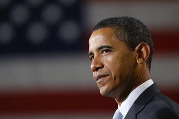 U.S. President-elect Barack Obama speaks at a ceremony for his whistle stop train trip at the train station in Philadelphia, Pennsylvania January 17, 2009.(Xinhua/Reuters Photo)