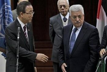 United Nations Secretary General Ban Ki-moon, left, reaches to shake hands with Palestinian President Mahmoud Abbas, following a joint press conference at Abbas' compound in the West Bank city of Ramallah, Friday, Jan. 16, 2009. The U.N. Secretary-General is in the Mideast to step up diplomatic efforts to get Israel and Hamas to adhere to a U.N. cease-fire resolution in the Gaza Strip and allow humanitarian aid into the devastated Palestinian territory.(AP Photo/Muhammed Muheisen)