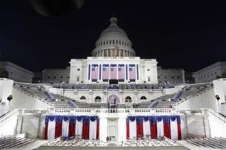 The Capitol is illuminated the night before the inauguration of President-elect Barack Obama in Washington January 19, 2009.(Scott Andrews/Pool/Reuters)