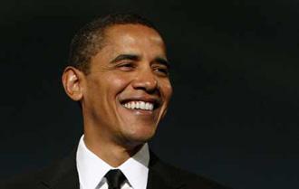 U.S. President-elect Barack Obama smiles while attending the Bipartisan dinner honoring U.S. Senator John McCain (R-AZ) in Washington Jan. 19, 2009. (Xinhua/Reuters Photo)
