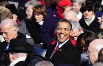 Barack Obama smiles before he takes oath as the 44th president of the United States of America in front of the U.S. Capitol in Washington D.C. Jan. 20, 2009. (Xinhua/Zhang Yan)