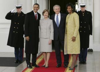 US President George W. Bush greets US President-elect Barack Obama (L) on the North Portico of the White House in Washington, January 20, 2009. First lady Laura Bush is second from left, and Michelle Obama is at right. [Agencies]