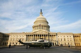 A helicopter waits at the US Capital before the inauguration ceremony of Barack Obama in Washington, January 20, 2009. President George W. Bush will leave the Capital on the helicopter following the inauguration ceremony. [Agencies]