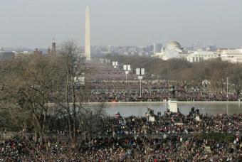 Spectators gather on the National Mall for the inauguration ceremony of President-elect Barack Obama in Washington, January 20, 2009. [Agencies]