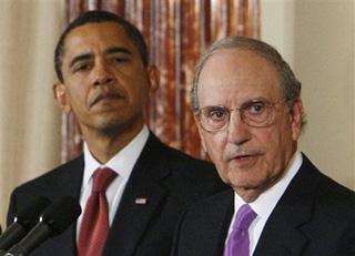 President&nbsp;Barack&nbsp;Obama&nbsp;looks&nbsp;on&nbsp;as&nbsp;Middle&nbsp;East&nbsp;envoy&nbsp;George&nbsp;Mitchell&nbsp;speaks&nbsp;at&nbsp;the&nbsp;State&nbsp;Department&nbsp;in&nbsp;Washington,&nbsp;Thursday,&nbsp;Jan.&nbsp;22,&nbsp;2009.&nbsp;(AP&nbsp;Photo/Charles&nbsp;Dharapak)