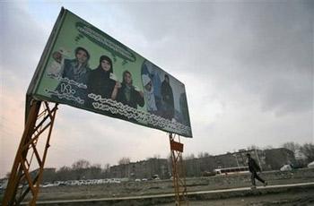 An election sign is seen placed in a part of the city in Kabul, Afghanistan on Thursday, Jan. 29, 2009. Afghanistan's presidential elections will be delayed four months until Aug. 20 to allow extra international forces enough time to bolster security, the election commission said Thursday.(AP Photo/Musadeq Sadeq) 