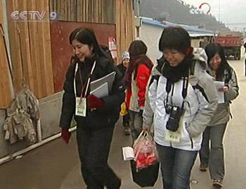 The biggest temporary housing area in the quake-hit zone is not a strange sight for these volunteers from Hong Kong.