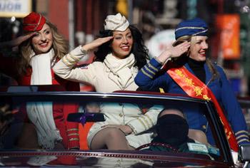 Misses New York take part in the parade celebrating the Chinese Lunar New Year, the Year of the Ox, on February 1, 2009 at the Chinatown in New York.(Xinhua/Hou Jun)