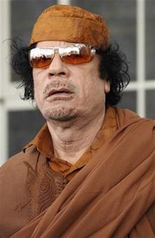 Libyan leader Moammar Gadhafi arrives at the African Union Meeting in Addis Ababa, Sunday, Feb. 1, 2009.(AP Photo/Samson Halieyesus)