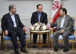 Iranian&nbsp;President&nbsp;Mahmoud&nbsp;Ahmadinejad&nbsp;(R)&nbsp;speaks&nbsp;with&nbsp;Hamas&nbsp;leader&nbsp;Khaled&nbsp;Meshaal&nbsp;with&nbsp;the&nbsp;aid&nbsp;of&nbsp;a&nbsp;translator&nbsp;(C)&nbsp;during&nbsp;a&nbsp;meeting&nbsp;in&nbsp;Tehran,&nbsp;February&nbsp;1,&nbsp;2009.&nbsp;(Xinhua/Reuters&nbsp;Photo)