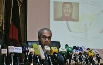 Sayed Ansari, spokesman for the National Directorate of Security(NDS), speaks during a news conference as the photographer of one of the suspected involved in a suicide attacks is displayed, at an NDS office in Kabul, Afghanistan, Tuesday, Feb. 3, 2009.(AP Photo/Rafiq Maqbool)