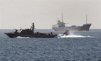 Israeli warships escort the Lebanese aid ship to Ashdod. The Israeli navy intercepted and boarded a Gaza-bound aid boat before escorting it to the Israeli port of Ashdod. (AFP/David Buimovitch)