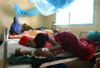 Somali refugee women rest inside a ward at the International Rescue Committee hospital in Hagadera camp near Daadab, about 80km (50 miles) from Liboi on the border with Somalia in north-eastern Kenya, February 4, 2009. The growing flow of Somalis fleeing conflict at home has led to overcrowding in refugee camps in neighbouring Kenya and the United Nations expects the influx to continue, an official said.(Noor Khamis/Reuters)