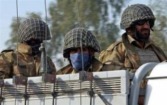 Pakistani troops in January 2009. Militants battling for Islamic law in northwest Pakistan's Swat valley could sign a peace deal on Monday, a government official and a pro-Taliban cleric said.(AFP/File/Tariq Mahmood)