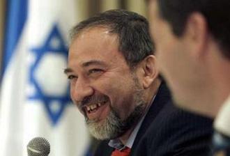 Avigdor Lieberman (L), leader of the Yisrael Beiteinu party, attends a meeting with Israel's President Shimon Peres (not pictured) in Jerusalem February 19, 2009.REUTERS/Ronen Zvulun