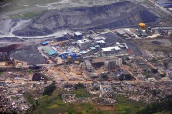 An aerial view of collapsed buildings in an industrial area in earthquake-affected Shifang, Sichuan province May 18, 2008. [Agencies]