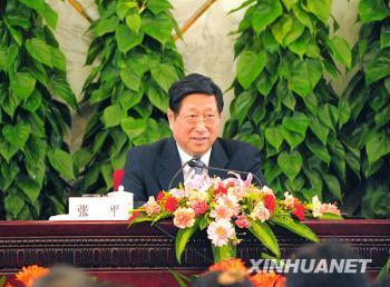 Zhang Ping, minister in charge of the National Development and Reform Commission of China, attends a press conference on dealing with the global financial crisis and maintaining steady and relatively rapid economic growth held by the Second Session of the 11th National People's Congress (NPC) at the Great Hall of the People in Beijing, capital of China, March 6, 2009. Chinese Finance Minister Xie Xuren and Zhou Xiaochuan, governor of the People's Bank of China, also attended the press conference. (Xinhua/Zhang Lei)
