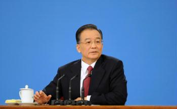 Chinese Premier Wen Jiabao answers questions during a press conference after the closing meeting of the Second Session of the 11th National People's Congress (NPC) at the Great Hall of the People in Beijing, capital of China, March 13, 2009. The annual NPC session closed on Friday. (Xinhua Photo)