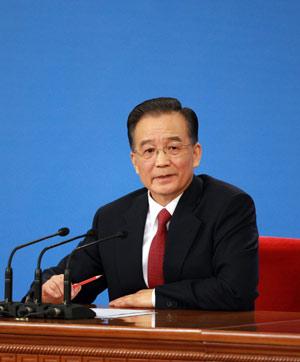 Chinese Premier Wen Jiabao answers questions during a press conference after the closing meeting of the Second Session of the 11th National People's Congress (NPC) at the Great Hall of the People in Beijing, capital of China, March 13, 2009. The annual NPC session closed on Friday. (Xinhua Photo)