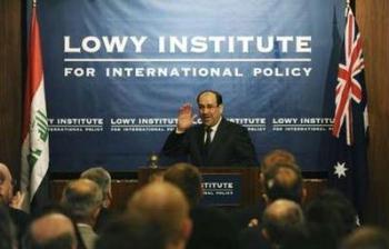 Iraq's Prime Minister Nouri al-Maliki delivers a speech at a business forum in Sydney March 13, 2009. Al-Maliki is in Australia on a five-day state visit.REUTERS/Dean Lewins/Pool (AUSTRALIA POLITICS BUSINESS)