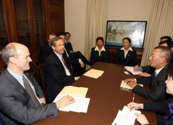 Shingtsa Tenzinchodrak (R), a living Buddha of the Kagyu sect of the Tibetan Buddhism and vice chairman of the Standing Committee of the People's Congress of Tibet Autonomous Region of China, meets with Mark Kirk (L2) and Rick Larsen (L1), co-chairmen of the U.S.-China Working Group in the House, in Washington, the United States, March 17, 2009. Mark Kirk and Rick Larsen, co-chairmen of the U.S.-China Working Group, met here on Tuesday with a five-member delegation of Tibetan deputies to China's National People's Congress, led by Shingtsa Tenzinchodrak. (Xinhua Photo)