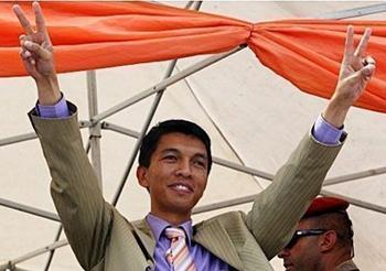 Madagascar's&nbsp;opposition&nbsp;leader&nbsp;Andry&nbsp;Rajoelina,&nbsp;seen&nbsp;here&nbsp;at&nbsp;a&nbsp;rally&nbsp;in&nbsp;Antananarivo&nbsp;on&nbsp;March&nbsp;18,&nbsp;has&nbsp;taken&nbsp;over&nbsp;as&nbsp;Madagascar&nbsp;interim&nbsp;president.&nbsp;Madagascar&nbsp;was&nbsp;suspended&nbsp;from&nbsp;the&nbsp;African&nbsp;Union&nbsp;and&nbsp;threatened&nbsp;with&nbsp;sanctions&nbsp;Friday,&nbsp;days&nbsp;after&nbsp;the&nbsp;army-backed&nbsp;toppling&nbsp;of&nbsp;the&nbsp;president,&nbsp;as&nbsp;the&nbsp;new&nbsp;government&nbsp;insisted&nbsp;no&nbsp;coup&nbsp;had&nbsp;taken&nbsp;place.(AFP/File/Alexander&nbsp;Joe)&nbsp;