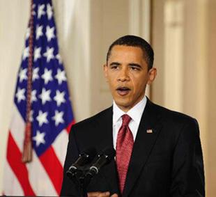 U.S. President Barack Obama delivers a speech during his second prime time news conference at the White House in Washington, March 24, 2009.(Xinhua/Zhang Yan)
