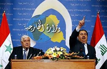 Iraqi Foreign Minister Hoshyar Zebari (R) gives a joint press conference with his Syrian counterpart Walid Muallem (L) following their meeting in Baghdad. Iraq said on Wednesday that security at its border with Syria had improved due to increased efforts by its neighbour to prevent foreign fighters infiltrating the country.(AFP/Ahmad al-Rubaye) 