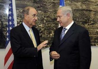 Israel's Prime Minister Benjamin Netanyahu (R) meets U.S. President Barack Obama's Middle East envoy George Mitchell in Tel Aviv April 16, 2009 in this picture released by the U.S. Embassy.REUTERS/Matty Stern/U.S. Embassy/Handout