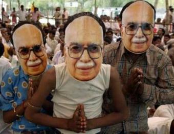Supporters of India's main opposition Bharatiya Janata Party (BJP) wear masks of BJP leader Lal Krishna Advani during an election campaign rally at Biaora, in the Rajgarh district of the central Indian state of Madhya Pradesh, April 22, 2009. India holds a general election between April 16 and May 13.REUTERS/Raj Patidar