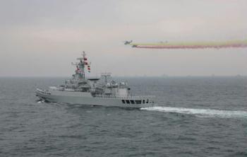 The "Mianyang" frigate of the Chinese People's Liberation Army (PLA) Navy takes part in a naval parade of the PLA Navy warships and aircraft in waters off Qingdao, east China's Shandong Province, on April 23, 2009.(Xinhua/Wang Jianmin)