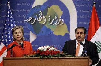 U.S. Secretary of State Hillary Rodham Clinton, left, and Iraqi Foreign Minister Hoshyar Zebari, address the media at a press conference in Baghdad, Iraq, Saturday, April 25, 2009.(AP Photo/Hadi Mizban, Pool)