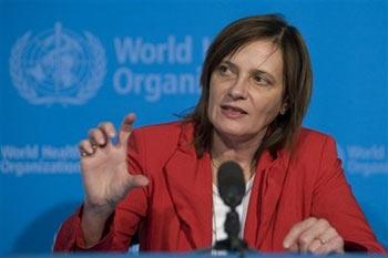 French Marie-Paule Kieny, Director of the Initiative for Vaccine Research of the World Health Oorganisation (WHO), informs the media about the H1N1 Flu during a new global press conference at the World Health Organisation (WHO) headquarters in Geneva, Switzerland, Friday, May 1, 2009. The WHO said on Friday that tests had shown the current seasonal vaccine against flu would have little effect against the new H1N1 strain. 'There is very little chance that the seasonal vaccine ... will be effective against this particular virus,' Marie-Paule Kieny, director of the WHO's initiative for vaccine research, told a news conference.(AP Photo/Keystone, Salvatore Di Nolfi)