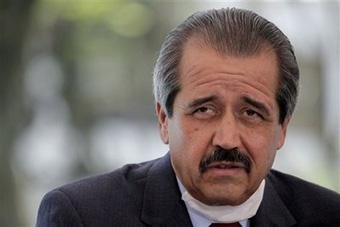 Mexico's Health Secretary Jose Angel Cordova listens to questions during a news conference on the swine flu outbreak in Mexico City, Thursday, April 30, 2009. (AP Photo/Eduardo Verdugo)
