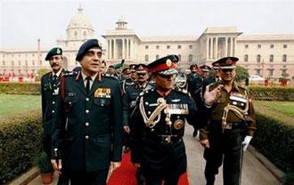 Nepalese Chief of Army Staff General Rookmangud Katawal (centre) has been sacked by the Maoist government for failing to comply with orders, a spokesman said, in a move that could trigger a showdown between the prime minister and the military.(AFP/File/Manan Vatsyayana)