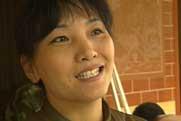 Quake victims rebuild houses