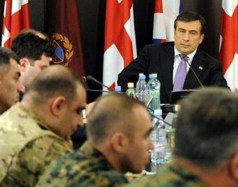Georgian&nbsp;President&nbsp;Mikheil&nbsp;Saakashvili&nbsp;holds&nbsp;a&nbsp;meeting&nbsp;with&nbsp;Defence&nbsp;Ministry&nbsp;staff&nbsp;in&nbsp;Tbilisi.&nbsp;NATO&nbsp;kicked&nbsp;off&nbsp;controversial&nbsp;military&nbsp;exercises&nbsp;in&nbsp;ex-Soviet&nbsp;Georgia&nbsp;on&nbsp;Wednesday&nbsp;as&nbsp;tensions&nbsp;spiked&nbsp;in&nbsp;relations&nbsp;with&nbsp;Russia&nbsp;over&nbsp;Moscow's&nbsp;expulsion&nbsp;of&nbsp;two&nbsp;alliance&nbsp;diplomats.(AFP/POOL/Irakli&nbsp;Gedenidze)