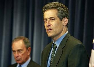 Richard Besser, acting director of the Centers for Disease Control and Prevention, speaks as New York Mayor Michael Bloomberg looks on at left, in Atlanta Wednesday, May 6, 2009.(AP Photo/John Bazemore)