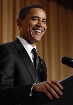 U.S. President Barack Obama laughs during his comic monologue during the White House Correspondents' Association Dinner in Washington May 9, 2009.(Xinhua/Reuters Photo)