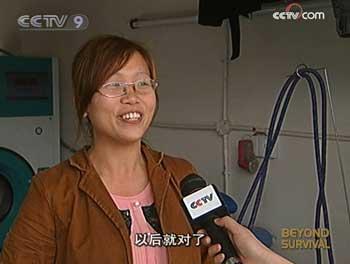 Liao Bangyan, a laundry owner, said, "I started the laundry business, after the quake. I had a baby. I want to work at home, so I can take care of my baby and make a living at the same time. Now business is not very satisfactory. But it's natural. And as time goes on, I think business will gradually get better."