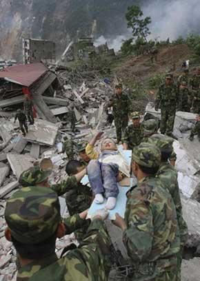 File Photo of 'Salute Boy' Lang Zheng being saved from the 5.12 quarke.