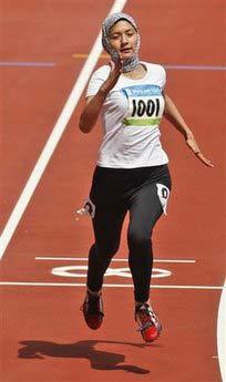 Robina&nbsp;Muqimyar&nbsp;of&nbsp;Afghanistan&nbsp;competes&nbsp;in&nbsp;the&nbsp;women's&nbsp;100m&nbsp;heats&nbsp;during&nbsp;the&nbsp;athletics&nbsp;competitions&nbsp;in&nbsp;the&nbsp;National&nbsp;Stadium&nbsp;at&nbsp;the&nbsp;Beijing&nbsp;2008&nbsp;Olympics&nbsp;in&nbsp;Beijing,&nbsp;Saturday,&nbsp;Aug.&nbsp;16,&nbsp;2008.&nbsp;Muqimyar&nbsp;—&nbsp;who&nbsp;in&nbsp;2004&nbsp;broke&nbsp;the&nbsp;gender&nbsp;barrier&nbsp;on&nbsp;the&nbsp;Afghan&nbsp;Olympic&nbsp;team&nbsp;—&nbsp;was&nbsp;last&nbsp;in&nbsp;a&nbsp;field&nbsp;of&nbsp;85&nbsp;in&nbsp;the&nbsp;women's&nbsp;100&nbsp;meters&nbsp;in&nbsp;a&nbsp;time&nbsp;of&nbsp;14.80,&nbsp;posted&nbsp;while&nbsp;running&nbsp;with&nbsp;a&nbsp;scarf&nbsp;covering&nbsp;her&nbsp;head.(AP&nbsp;Photo/Kevin&nbsp;Frayer)&nbsp;