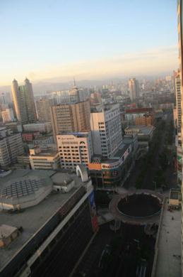 Urumqi, capital of China's Xinjiang autonomous region, wakes up to the morning sun on Monday August 17, 2009. [Photo:CRIENGLISH.com/Dominic Swire]