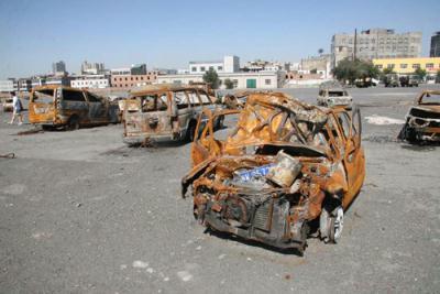 Burnt out cars are all that remain in this former second hand car market where the Xinjiang riots began. Photo taken Wednesday 20 August, 2009.[Photo:CRIENGLISH.com]