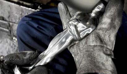 The&nbsp;rough&nbsp;edges&nbsp;are&nbsp;trimmed&nbsp;off&nbsp;and&nbsp;the&nbsp;pewter&nbsp;Oscar&nbsp;is&nbsp;thoroughly&nbsp;polished&nbsp;(Picture:&nbsp;EPA)