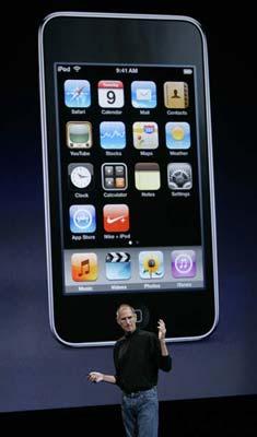 Apple Inc CEO Steve Jobs shows off a thinner iPod Touch at Apple's 