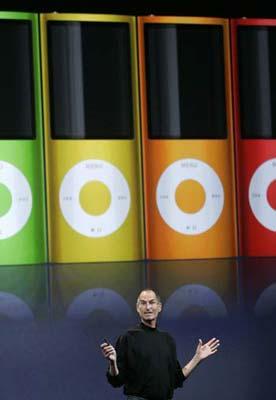 Apple Inc CEO Steve Jobs speaks as colorful, redesigned iPod Nano's are displayed at Apple's 