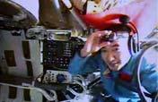 Astronauts assemble EVA suit for spacewalk